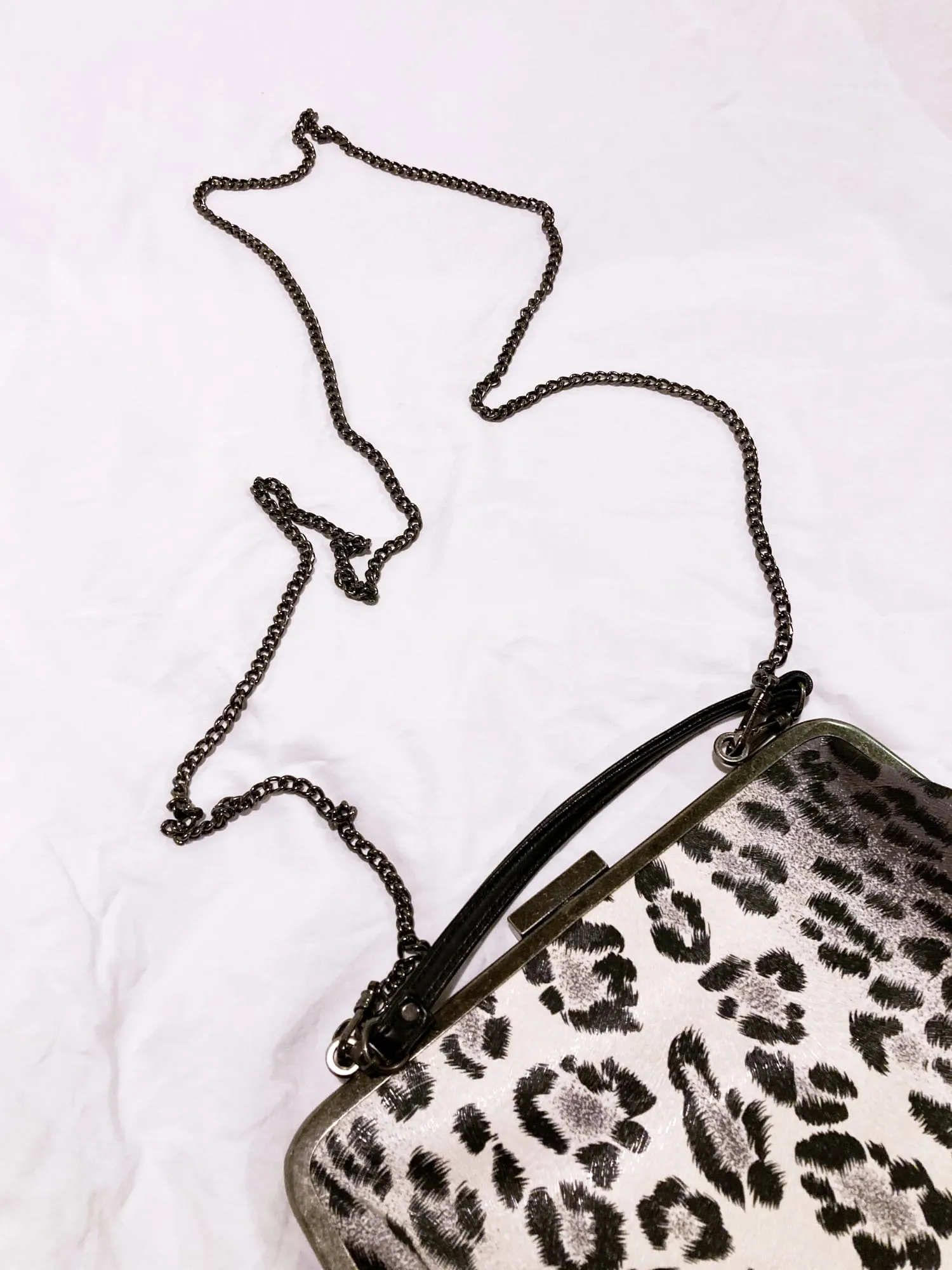 Jean Colonna 1990s small white and black vinyl leopard print chain strap party bag